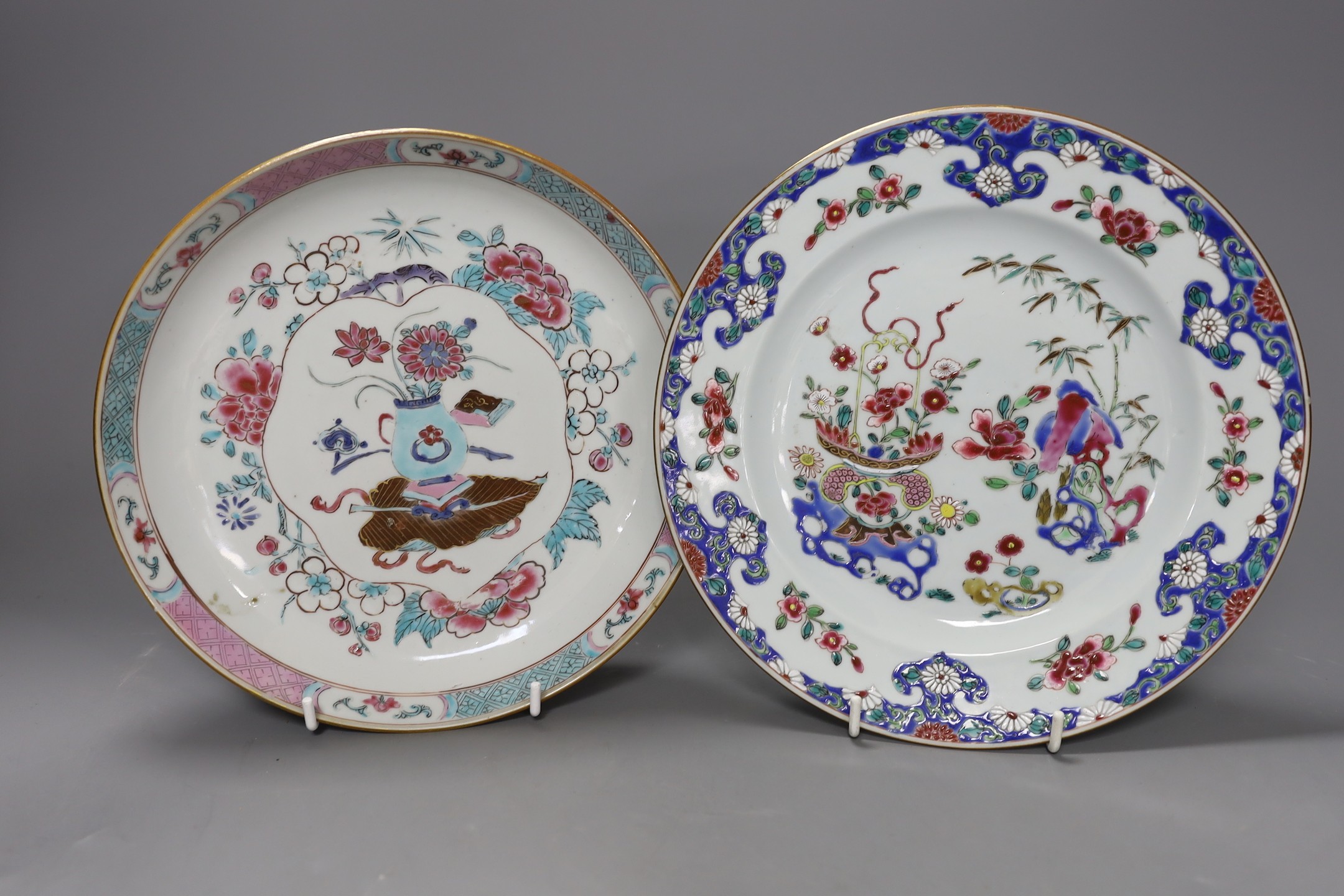 A Set of three 18th century Chinese export famille rose plates and a similar dish, largest 22.5cm diameter